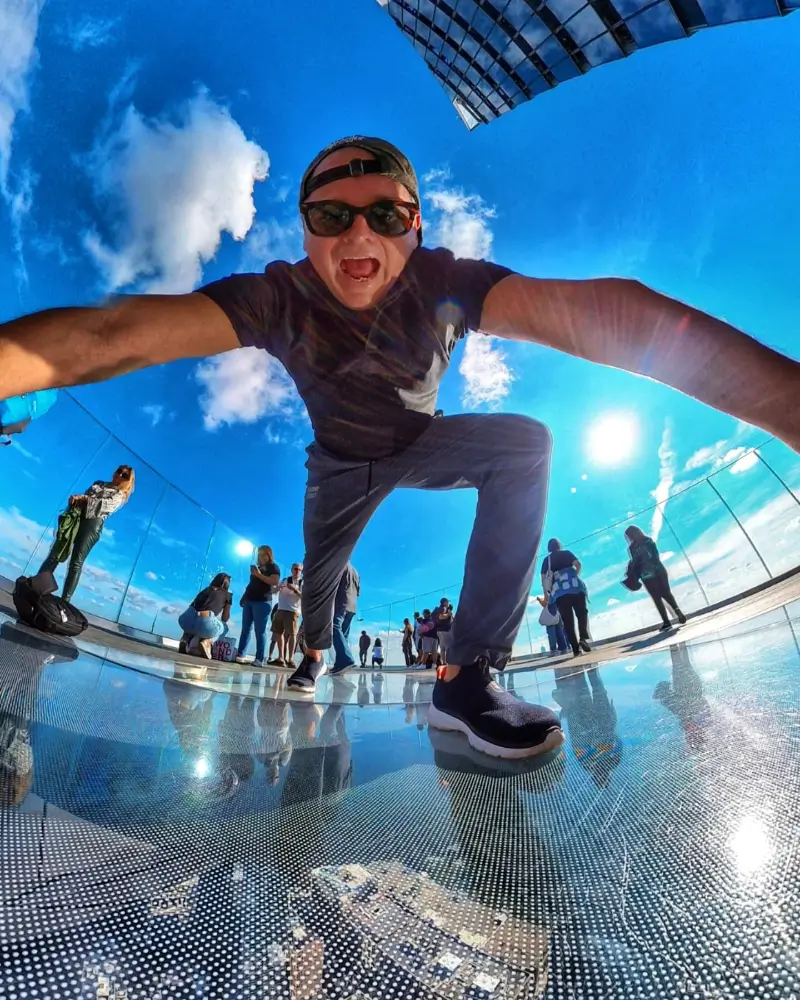 A man riding on top of a skateboard.