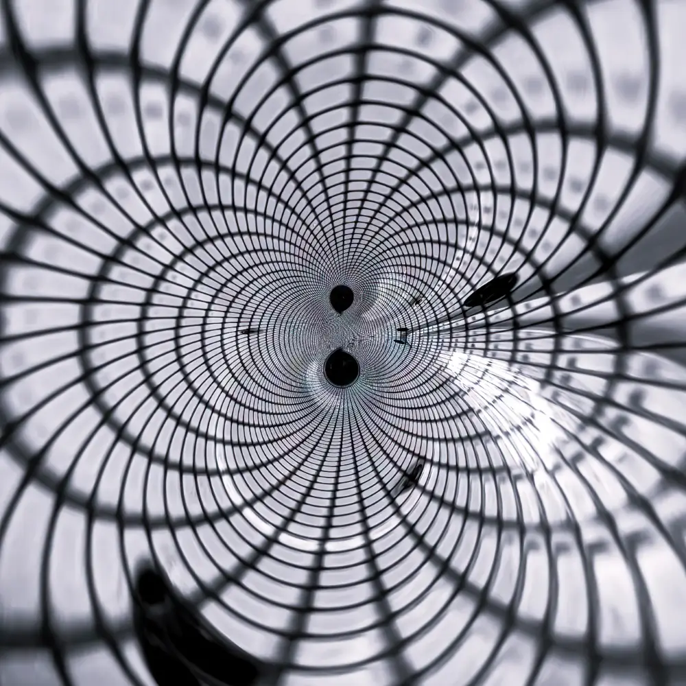 A black and white photo of a spiral pattern.