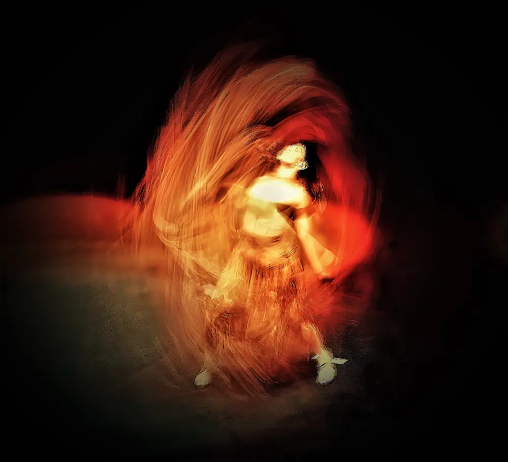 A blurry picture of a person in the dark.