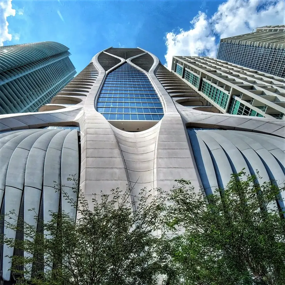 A view of the top of a building from below.