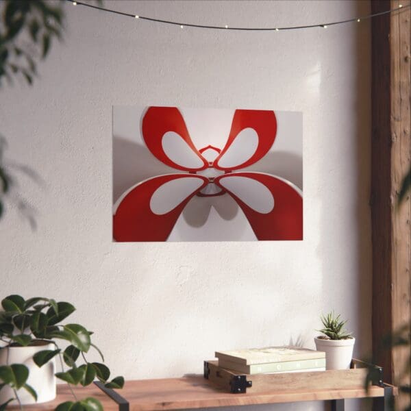 A painting of a red and white flower on the wall