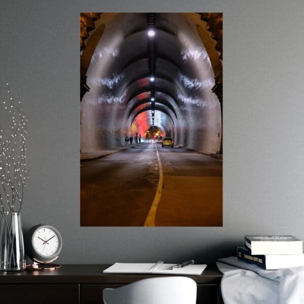 A picture of an empty tunnel with the lights on.