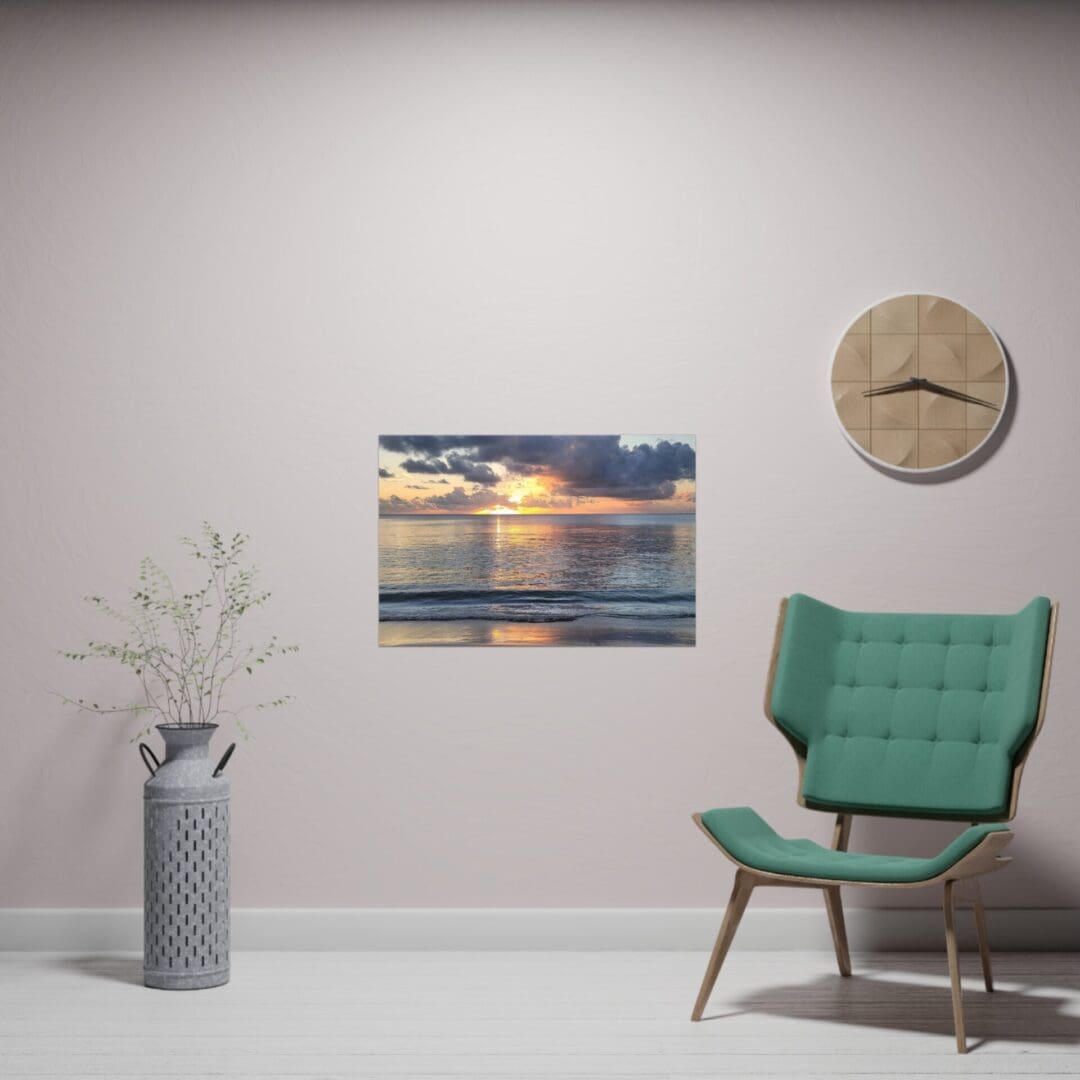 A chair and clock in a room with a painting of the ocean.