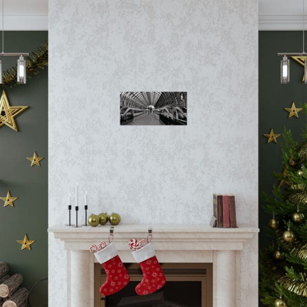 A fireplace with christmas stockings hanging on it.