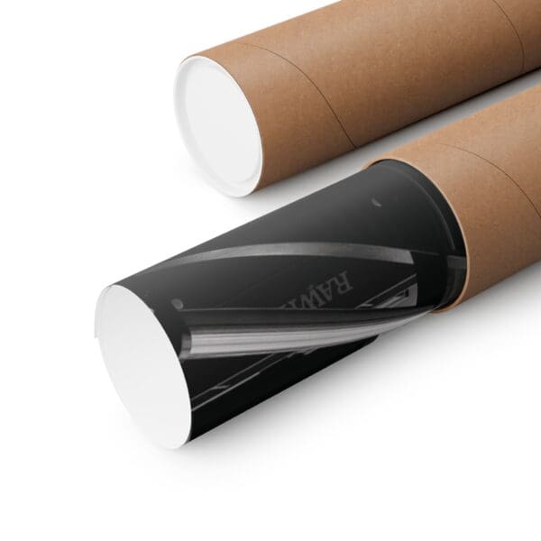 A roll of black paper next to a brown tube.