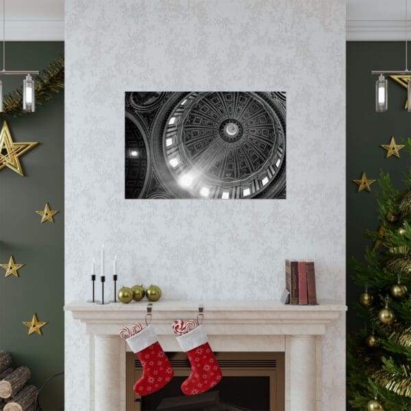 A fireplace with christmas decorations and a picture of a clock.