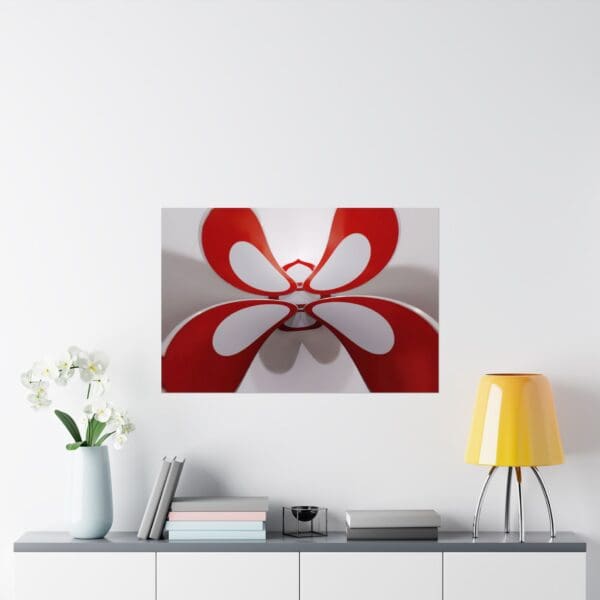 A white and red painting on the wall