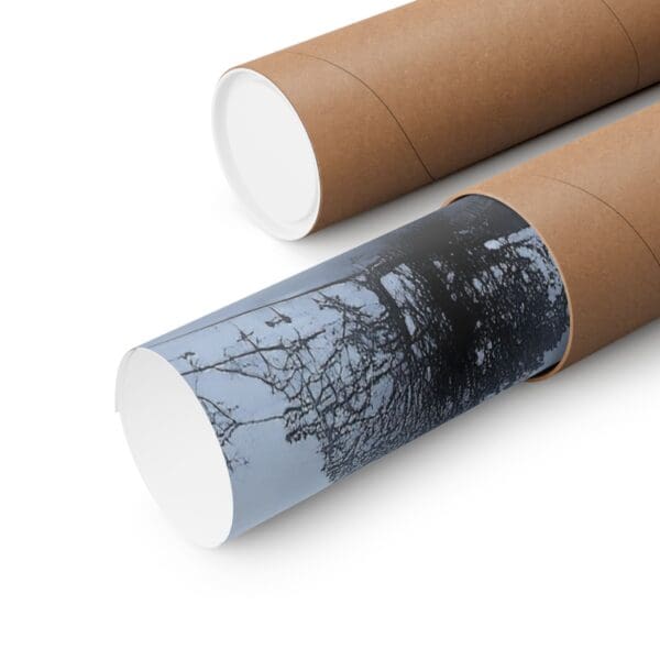 A close up of two cardboard tubes with trees on them