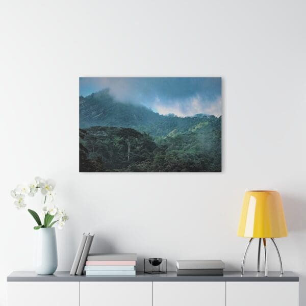 A painting of mountains with a sky background