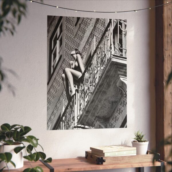 A woman climbing up the side of an old building.