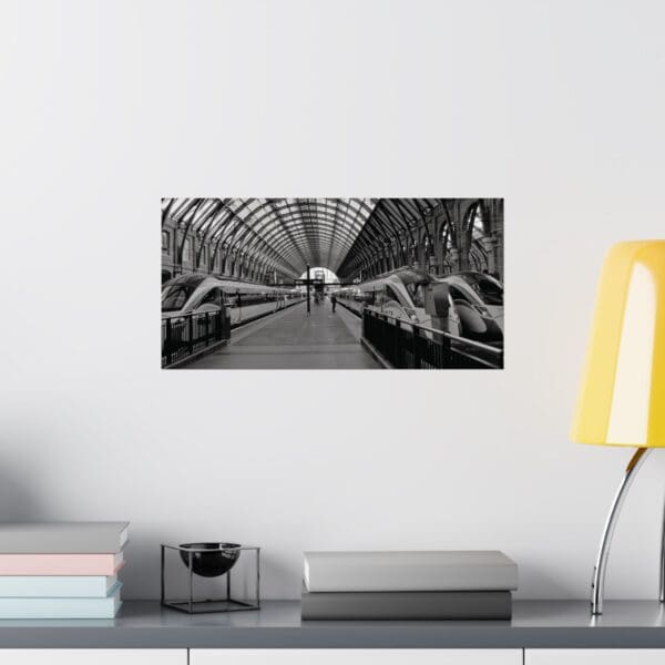 A black and white photo of a train station.