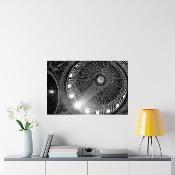 A black and white photo of a room with a table