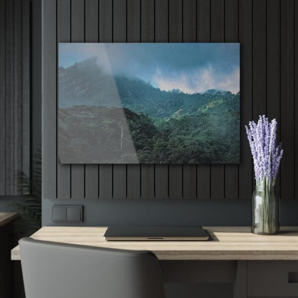 A tv on the wall in front of a table.