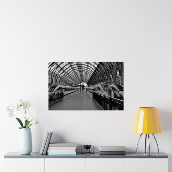 A black and white photo of a train station.