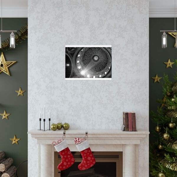 A fireplace with christmas decorations and a picture of a clock.