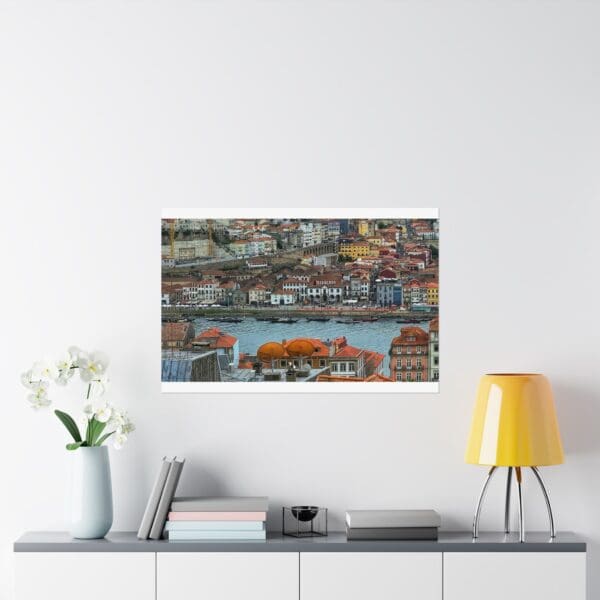 A painting of the city with many buildings and water