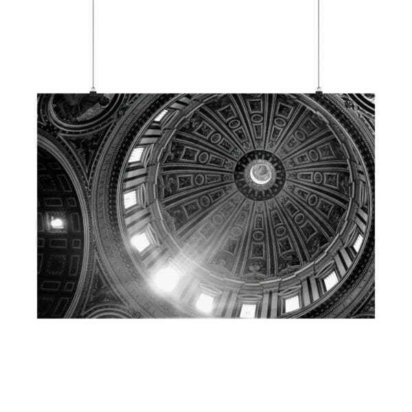 A black and white photo of the ceiling in a building.