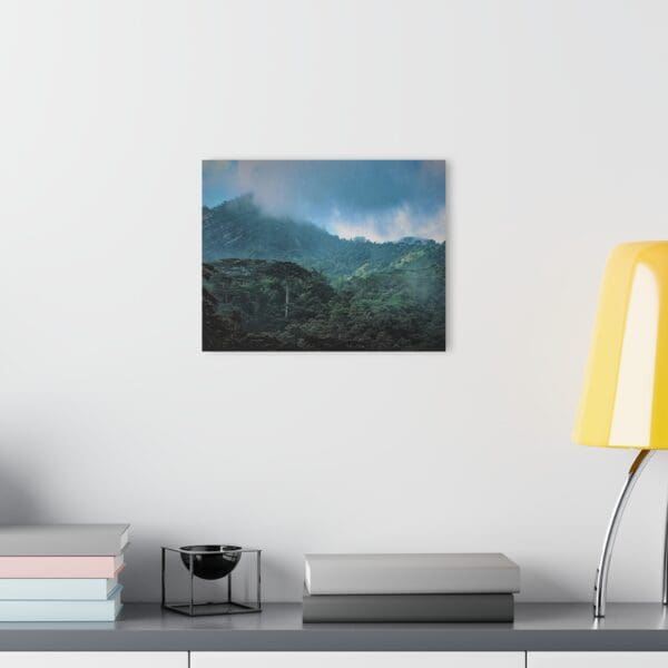 A painting of mountains with a sky background