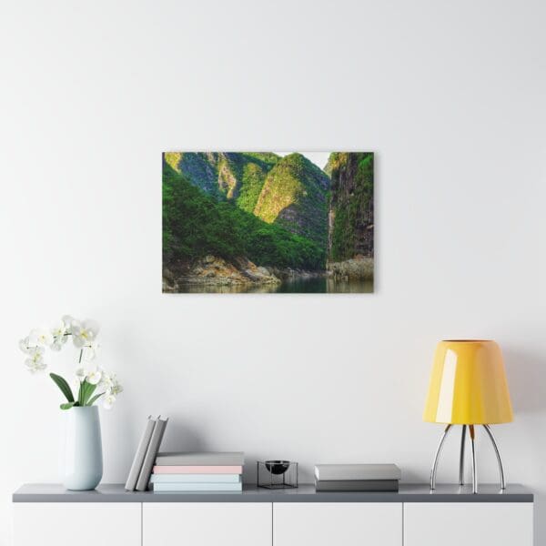 A painting of trees and rocks in the woods