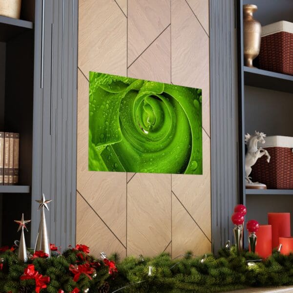 A picture of a green rose on the wall.