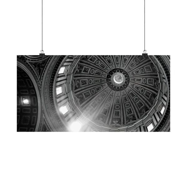 A black and white photo of a ceiling with lights.