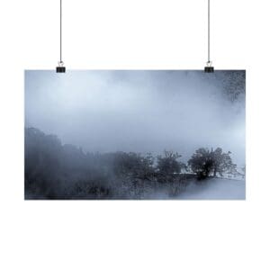 A foggy landscape with trees and bushes hanging from a ceiling.