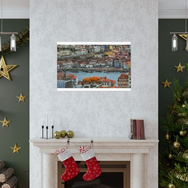 A fireplace with christmas decorations and a painting of a car.