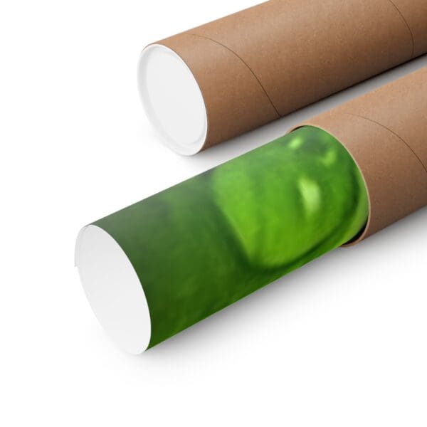 A close up of two tubes with green paper on them