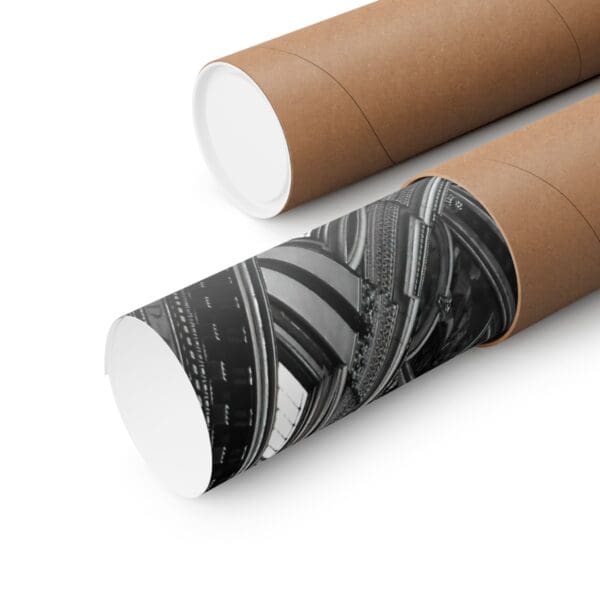 A close up of two cardboard tubes with black and white designs