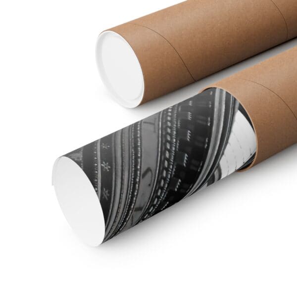 A roll of brown paper next to a tube.