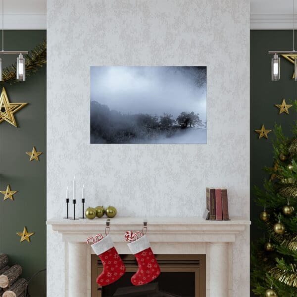 A fireplace with christmas stockings and a painting of a boat in the water.