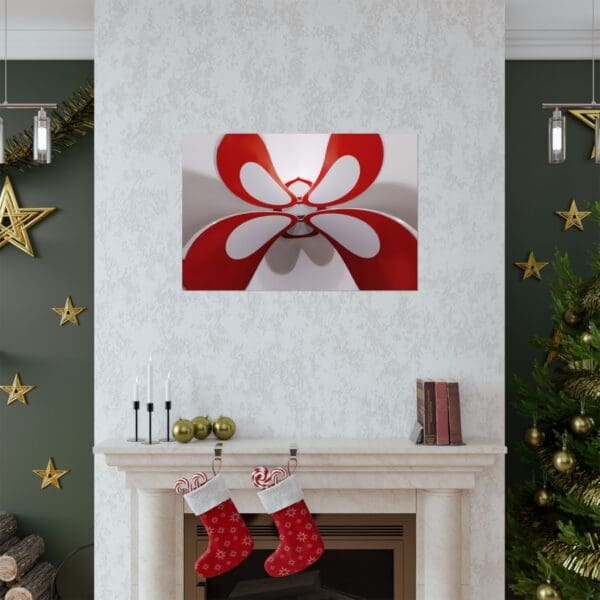 A fireplace with christmas decorations and a red and white flower.