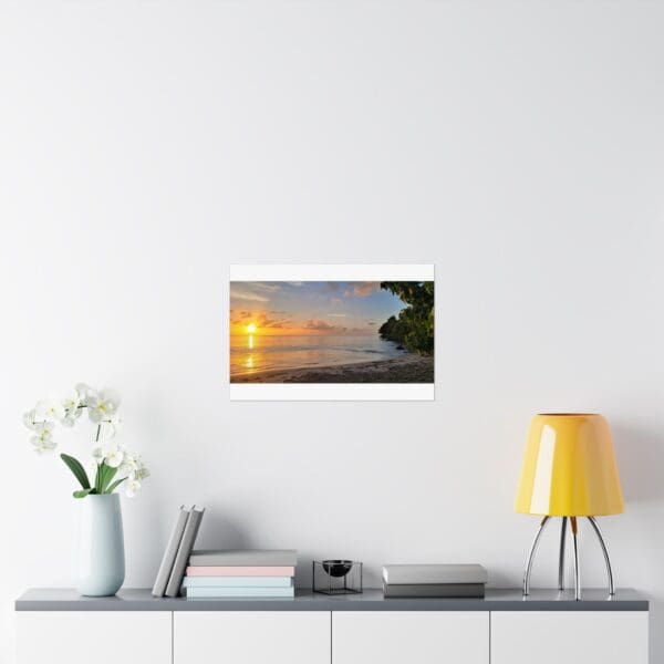 A white wall with a yellow lamp and some flowers