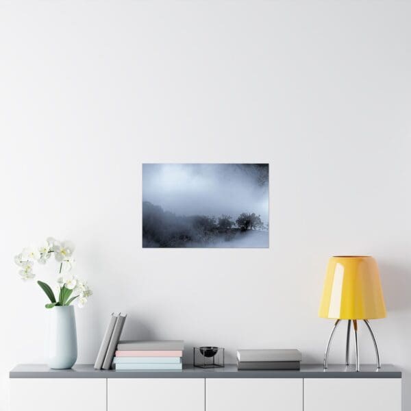 A white wall with some flowers and a table